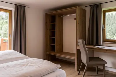 Ein Bett oder Betten in einem Zimmer der Unterkunft Chalet Gasteig