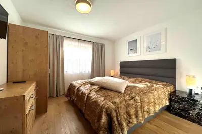 Ein Bett oder Betten in einem Zimmer der Unterkunft AlpenPura - Chalet mit Sauna und Panoramablick