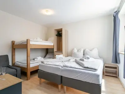 Ein Bett oder Betten in einem Zimmer der Unterkunft Town House 1