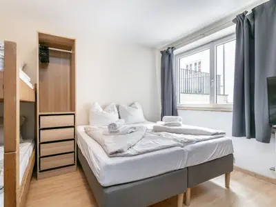 Ein Bett oder Betten in einem Zimmer der Unterkunft Town House 1