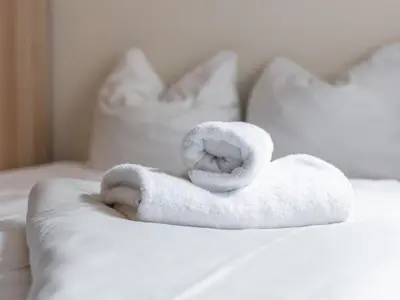 Ein Bett oder Betten in einem Zimmer der Unterkunft Town House 1