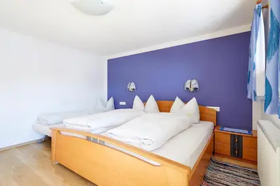 Ein Bett oder Betten in einem Zimmer der Unterkunft Haus Heachmoos