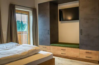 Ein Bett oder Betten in einem Zimmer der Unterkunft Weinzeit Chalet