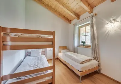 Ein Bett oder Betten in einem Zimmer der Unterkunft Chalet Lux - Chaletdorf am Sonnenhang