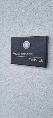 Ein Zertifikat, Auszeichnung, Logo oder anderes Dokument, das in der Unterkunft Apartment Talblick ausgestellt ist