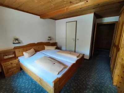 Ein Bett oder Betten in einem Zimmer der Unterkunft Gasthaus Mitterjager