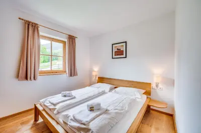 Ein Bett oder Betten in einem Zimmer der Unterkunft Chalet #1 am Sonnenhang