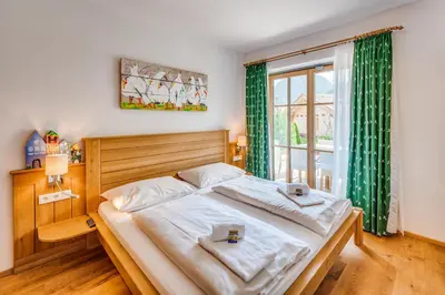 Ein Bett oder Betten in einem Zimmer der Unterkunft Chalet #4 - Edelweiss