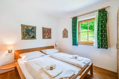 Ein Bett oder Betten in einem Zimmer der Unterkunft Chalet #4 - Edelweiss