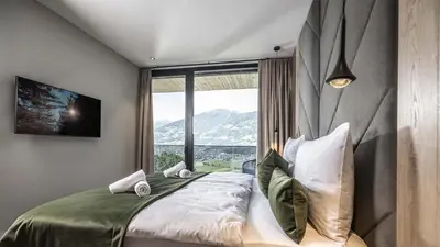 Ein Bett oder Betten in einem Zimmer der Unterkunft Panorama Eagle Lodge