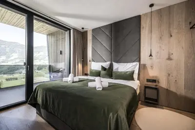 Ein Bett oder Betten in einem Zimmer der Unterkunft Panorama Eagle Lodge
