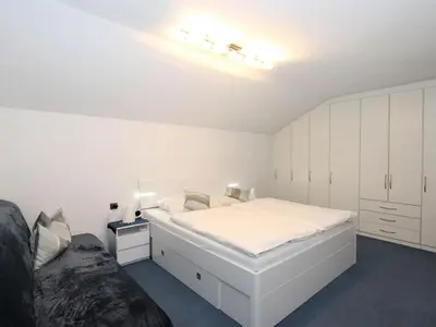 Ein Bett oder Betten in einem Zimmer der Unterkunft Apartment Appartements Binderhof-2 by Interhome