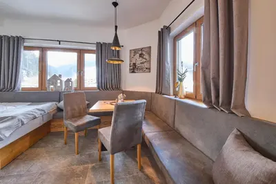 Ein Sitzbereich in der Unterkunft Appartements Der Fuchsbau