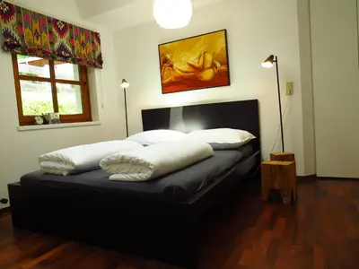 Ein Bett oder Betten in einem Zimmer der Unterkunft Art Appartement