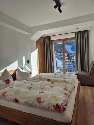 Ein Bett oder Betten in einem Zimmer der Unterkunft Reiterhof