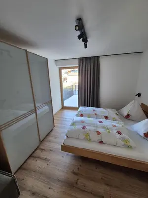 Ein Bett oder Betten in einem Zimmer der Unterkunft Reiterhof