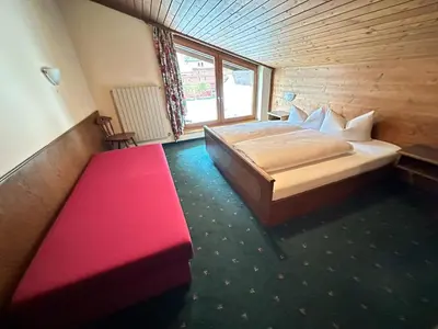 Ein Bett oder Betten in einem Zimmer der Unterkunft Appartementhaus Zillertal Arena
