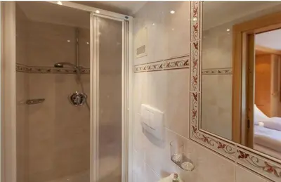 Ein Badezimmer in der Unterkunft Pension Edelweiss