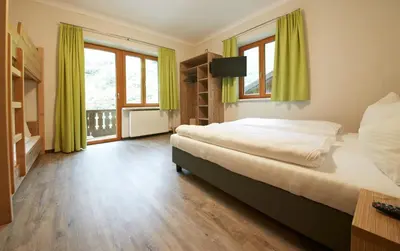 Ein Bett oder Betten in einem Zimmer der Unterkunft Holiday Lodge Central