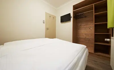 Ein Bett oder Betten in einem Zimmer der Unterkunft Holiday Lodge Central