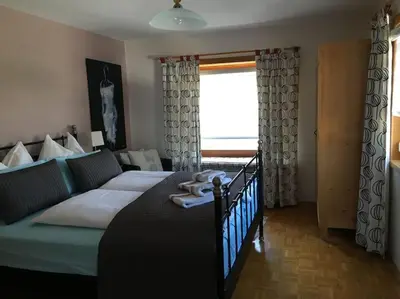 Ein Bett oder Betten in einem Zimmer der Unterkunft 9 persons apartment Haus Jens