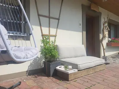 Ein Sitzbereich in der Unterkunft 9 persons apartment Haus Jens