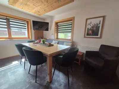 Ein Sitzbereich in der Unterkunft 9 persons apartment Haus Jens