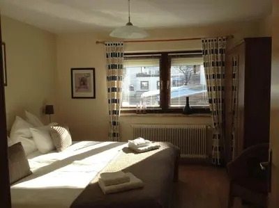 Ein Bett oder Betten in einem Zimmer der Unterkunft 9 persons apartment Haus Jens