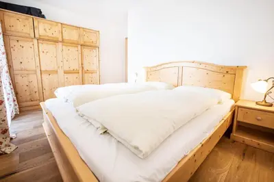 Ein Bett oder Betten in einem Zimmer der Unterkunft Ferienwohnung Hochkrimml 19 __1-4