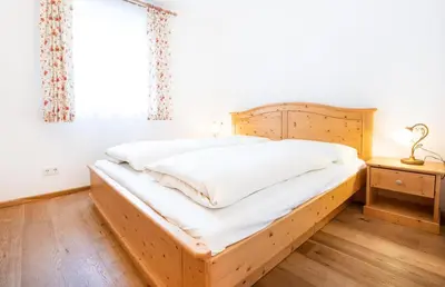 Ein Bett oder Betten in einem Zimmer der Unterkunft Ferienwohnung Hochkrimml 19 __1-4