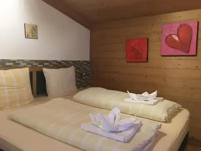 Ein Bett oder Betten in einem Zimmer der Unterkunft Landhaus Taxach