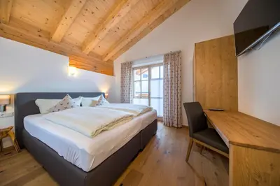 Ein Bett oder Betten in einem Zimmer der Unterkunft Penthauswohnung am Sonnenhang