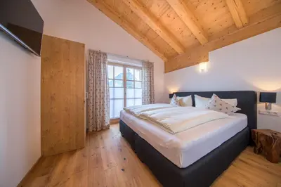 Ein Bett oder Betten in einem Zimmer der Unterkunft Penthauswohnung am Sonnenhang