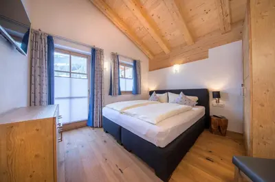 Ein Bett oder Betten in einem Zimmer der Unterkunft Penthauswohnung am Sonnenhang
