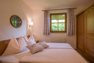 Ein Bett oder Betten in einem Zimmer der Unterkunft Ferienwohnung Widauer