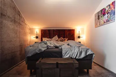 Ein Bett oder Betten in einem Zimmer der Unterkunft PHILSON Apartments