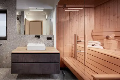 Ein Badezimmer in der Unterkunft Alpin Residenzen Eichenheim Aurach bei Kitzbühel by Alpina-Holiday