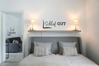 Ein Bett oder Betten in einem Zimmer der Unterkunft Ferienwohnung Dohr