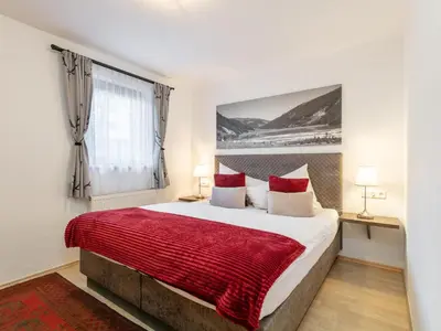 Ein Bett oder Betten in einem Zimmer der Unterkunft Rosalie-Lorena