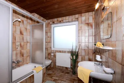 Ein Badezimmer in der Unterkunft Ferienwohnungen Rahm
