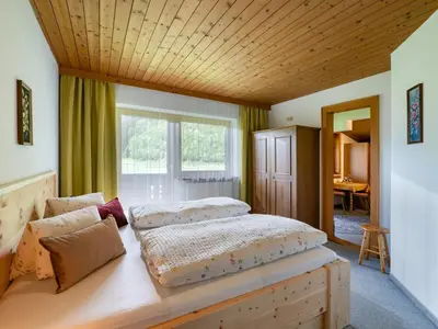 Ein Bett oder Betten in einem Zimmer der Unterkunft Furtherhof - Winter