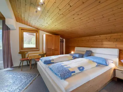 Ein Bett oder Betten in einem Zimmer der Unterkunft Furtherhof - Winter
