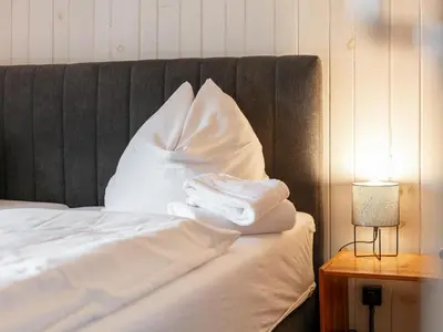 Ein Bett oder Betten in einem Zimmer der Unterkunft Gaisbergblick