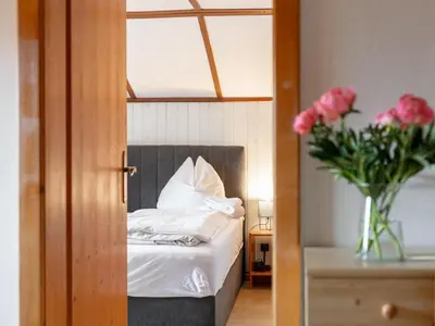 Ein Bett oder Betten in einem Zimmer der Unterkunft Gaisbergblick