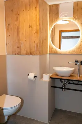 Ein Badezimmer in der Unterkunft SÖLLHOF Ferienhaus mit 11 Schlafzimmern I großer Gemeinschaftsraum I Skibushaltestelle I 10 Min zum Skigebiet