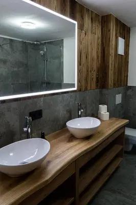 Ein Badezimmer in der Unterkunft SÖLLHOF Ferienhaus mit 11 Schlafzimmern I großer Gemeinschaftsraum I Skibushaltestelle I 10 Min zum Skigebiet