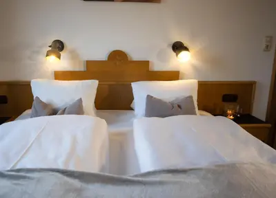 Ein Bett oder Betten in einem Zimmer der Unterkunft Haus Alpin