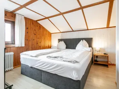 Ein Bett oder Betten in einem Zimmer der Unterkunft Rettenstein und Gaisbergblick
