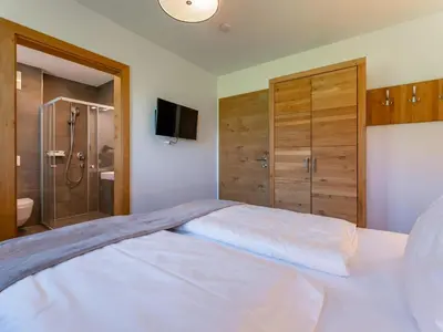 Ein Bett oder Betten in einem Zimmer der Unterkunft Chalet Lengberg B1
