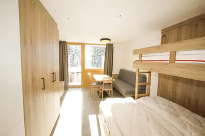 Ein Bett oder Betten in einem Zimmer der Unterkunft Ferienwohnung 62 - Top 30